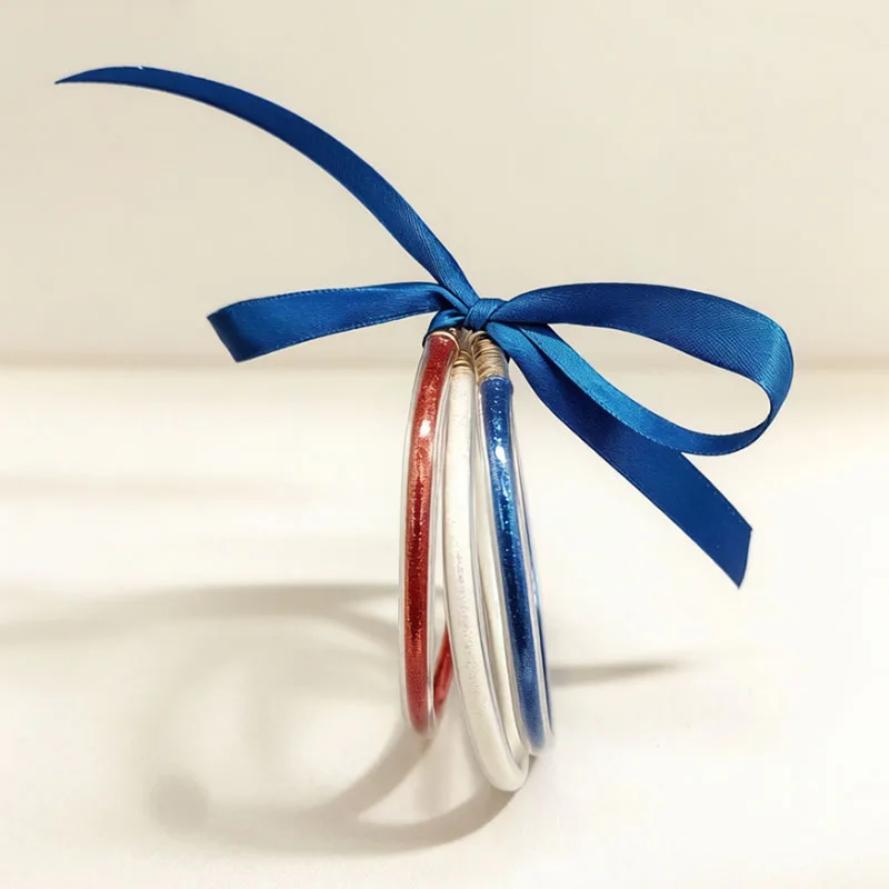 Pulseras infantiles de gelatina con lazo y brillo para fiestas - imagen 3