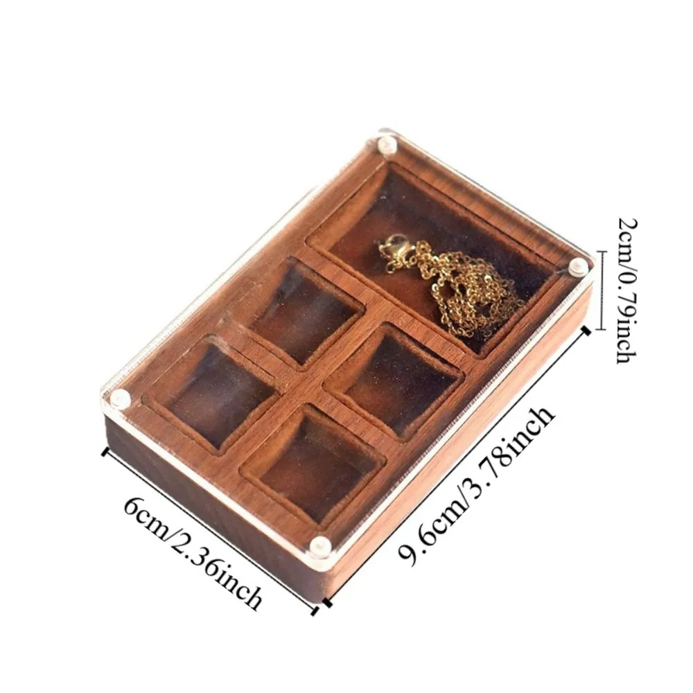 Caja para anillos de madera con ventana en nogal negro