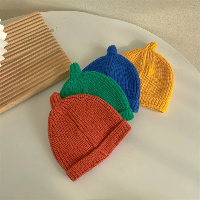 Gorro de punto grueso y cálido con protección auditiva para bebé