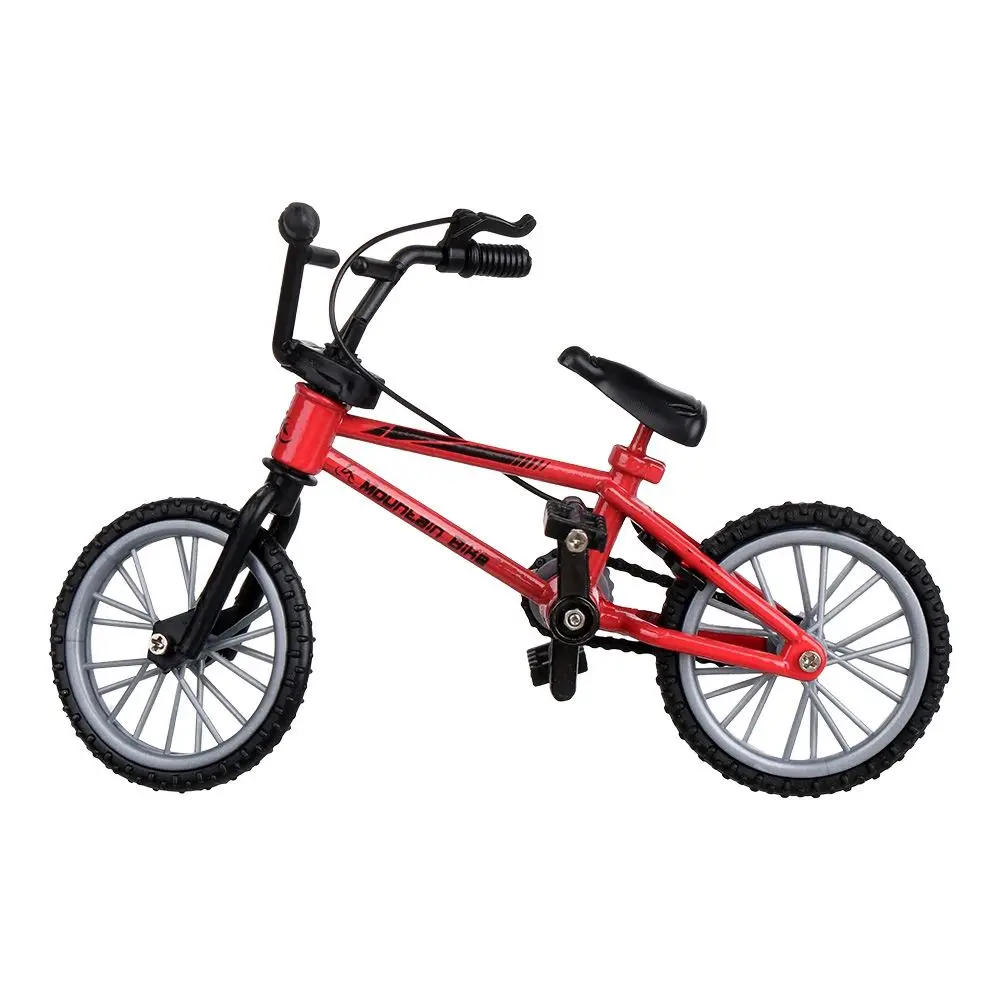 Bicicleta compacta para muñecas pequeñas