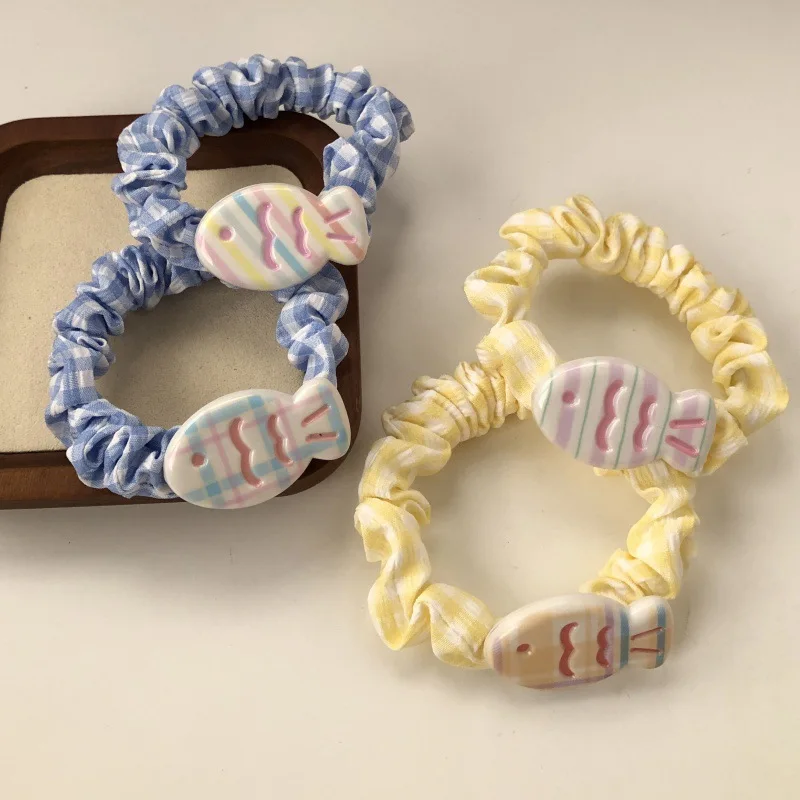 Diadema infantil con estampado de pez y rayas – Color crema - imagen 2