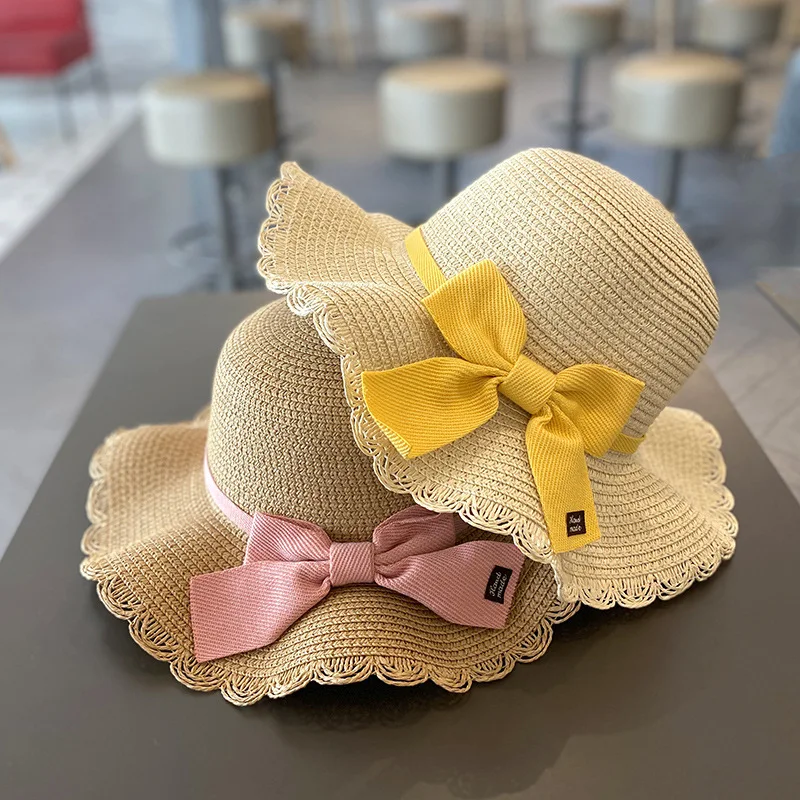 Sombrero de paja para niña con lazo de encaje