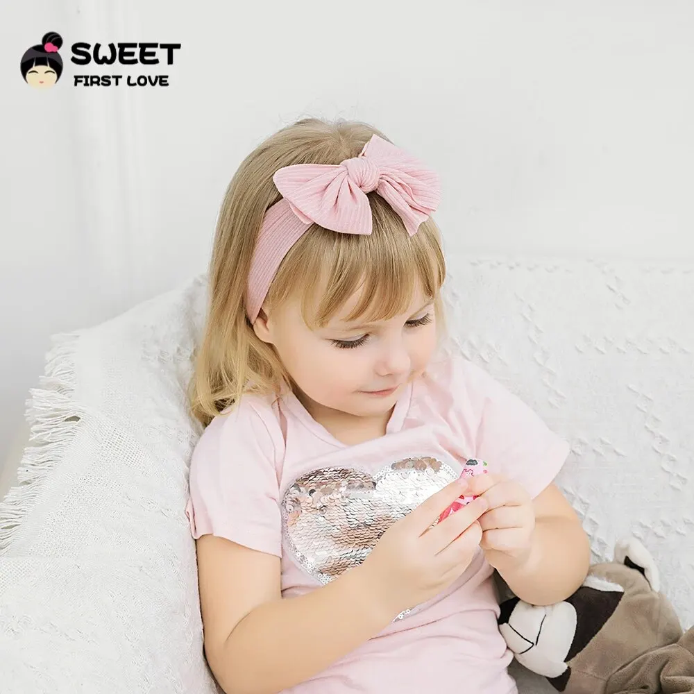 Diadema elástica con lazo para bebé – Suave y adorable - imagen 5