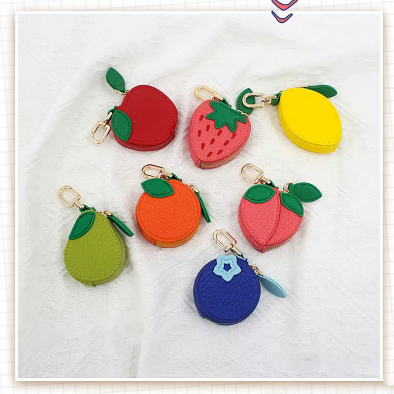 Monedero infantil con colgante de frutas