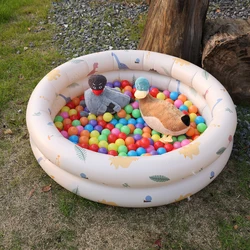 Pozo de bolas inflable de dinosaurios plegable para niños