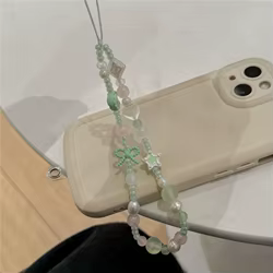 Cadena para móvil niña con lazo de estrella y luna verde – Antipérdida