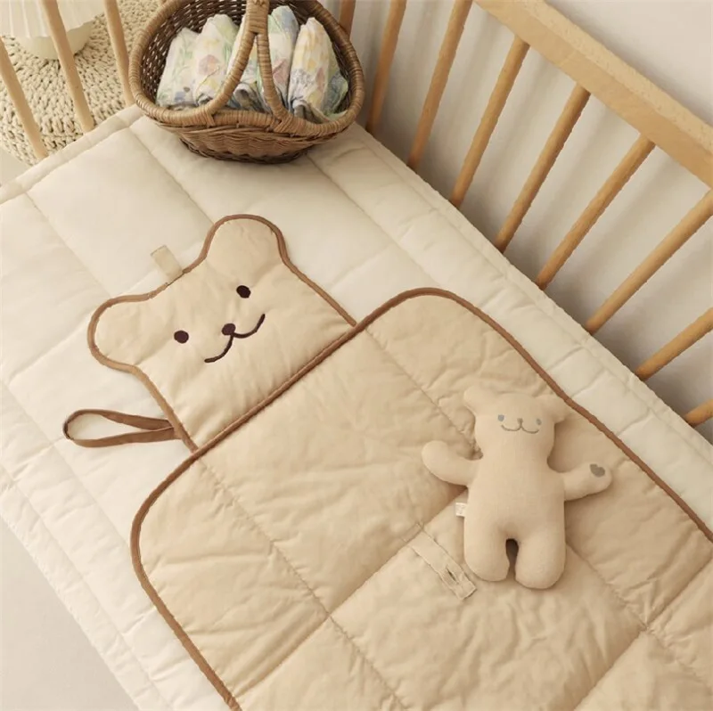 Cambiador portátil acolchado y plegable para bebé