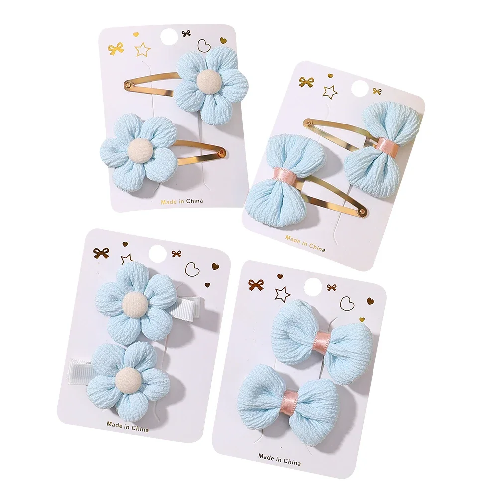 Set de horquillas con flores en tonos pastel