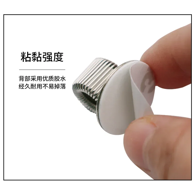 Clip multifuncional para bolígrafo con resorte y base autoadhesiva - imagen 4
