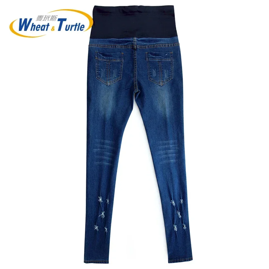 Jeans de maternidad de algodón con agujeros y bolsillos a contraste - imagen 4