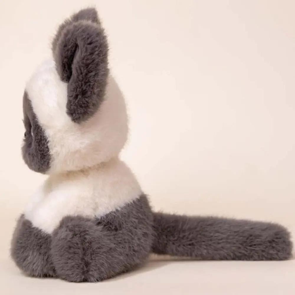 Peluche de gato siamés Devon Rex sentado como adorno de escritorio