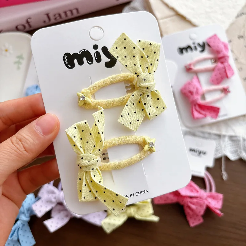 Accesorios para el cabello con lazo de lunares: pinzas y diademas - imagen 2