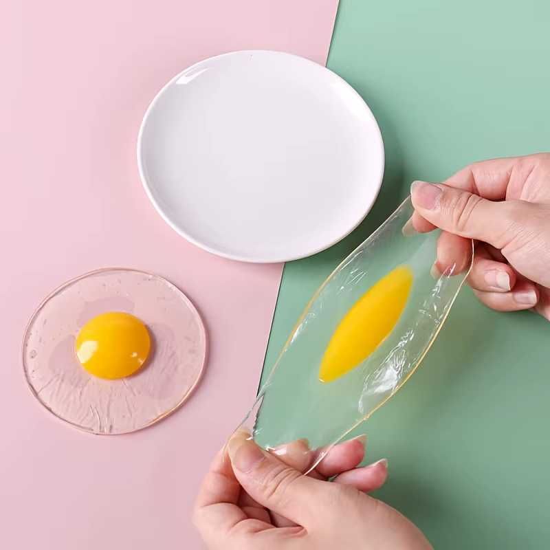 Funky Egg Splat Ball pelota antiestrés huevo estrujable para niños - imagen 2