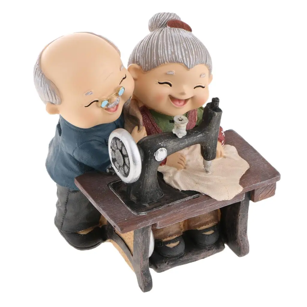 Figura decorativa de pareja de ancianos en resina para aniversario