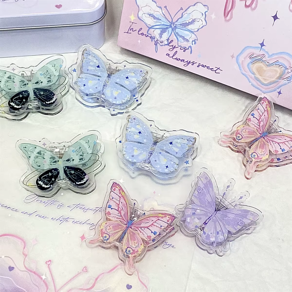 Clips mariposa acrílicos transparentes para carpetas escolares - imagen 2