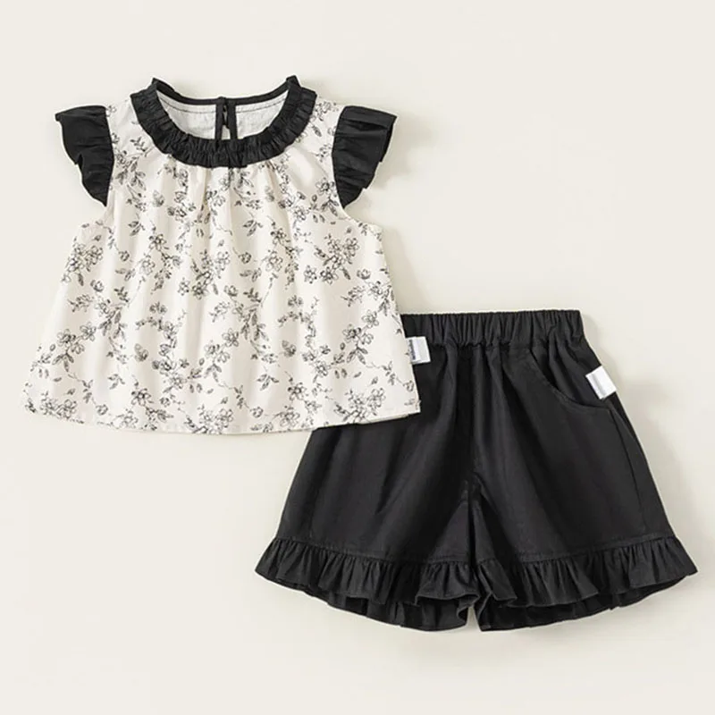 Conjunto verano niña: top sin mangas floral y pantalón corto negro