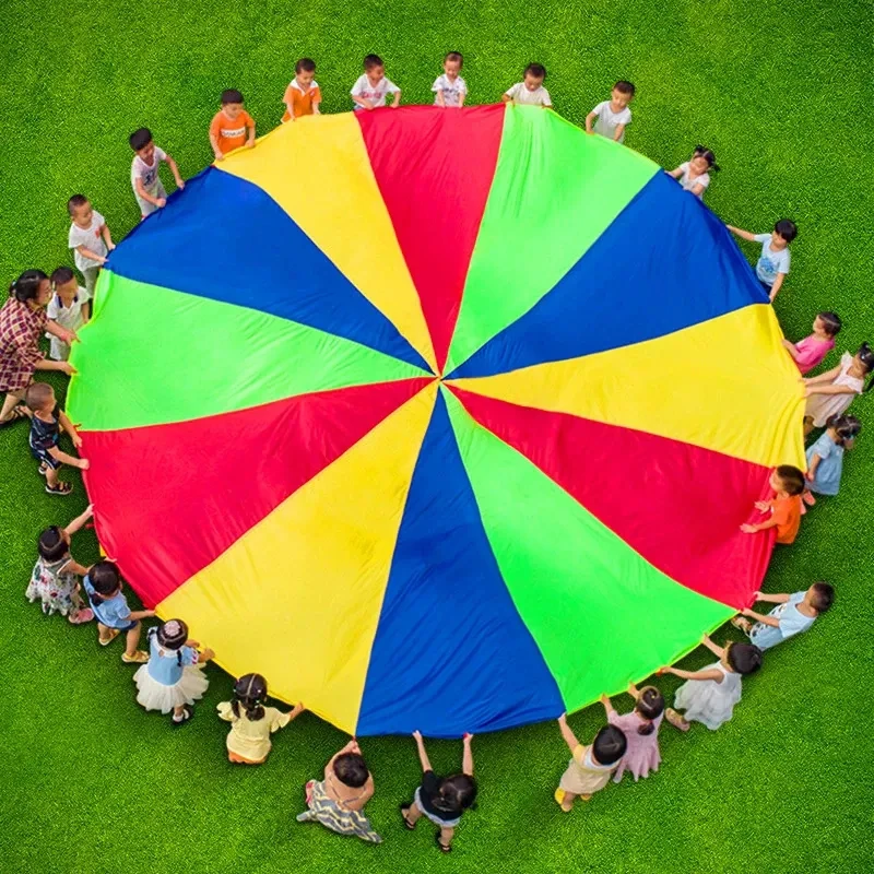 Paracaídas arcoíris infantil para juegos en equipo al aire libre