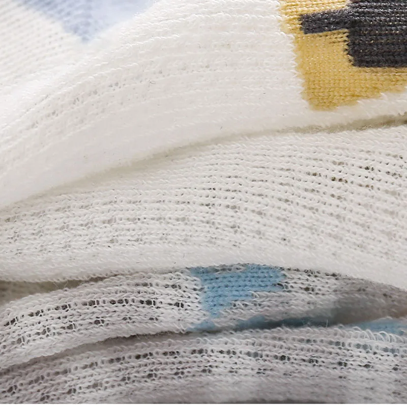 Dibujo de patos en prenda infantil