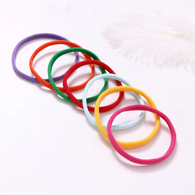 Diadema de nailon elástica para niñas – Tocado infantil y bebé