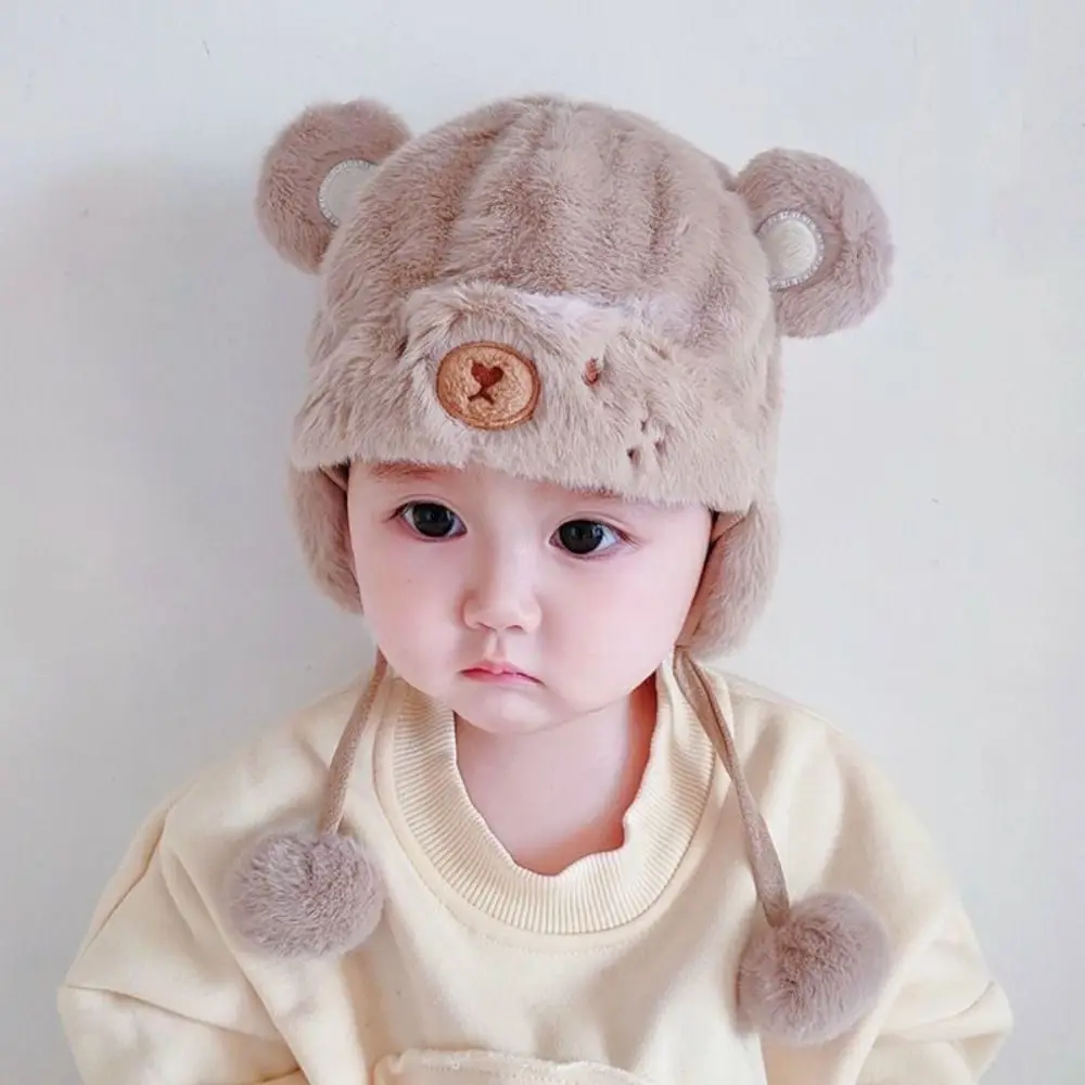Gorro calentito con pompón para niños – Protección de oídos en invierno - imagen 2