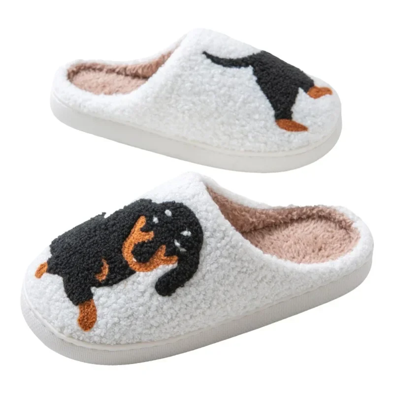 Vista superior del bordado de teckel en zapatilla infantil