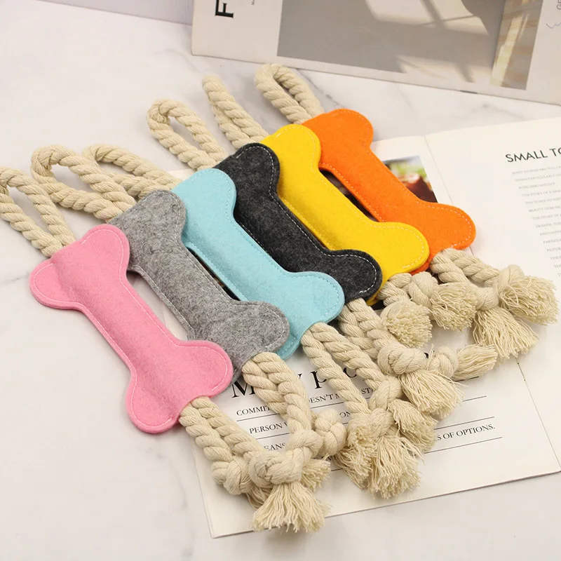 Juguete masticable para perros con forma de hueso en fieltro