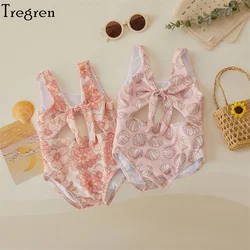 Bañador de niña sin mangas con estampado floral y concha