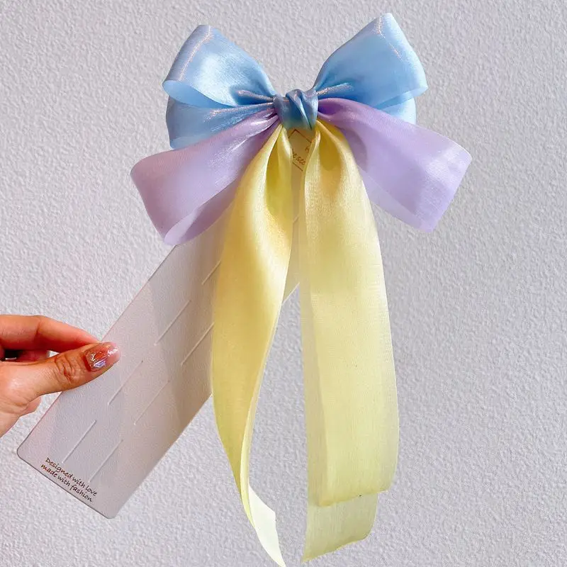 Pasador de pelo con lazo y lentejuelas para niñas