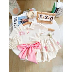 Conjunto de camiseta polo y falda con lazo para niña