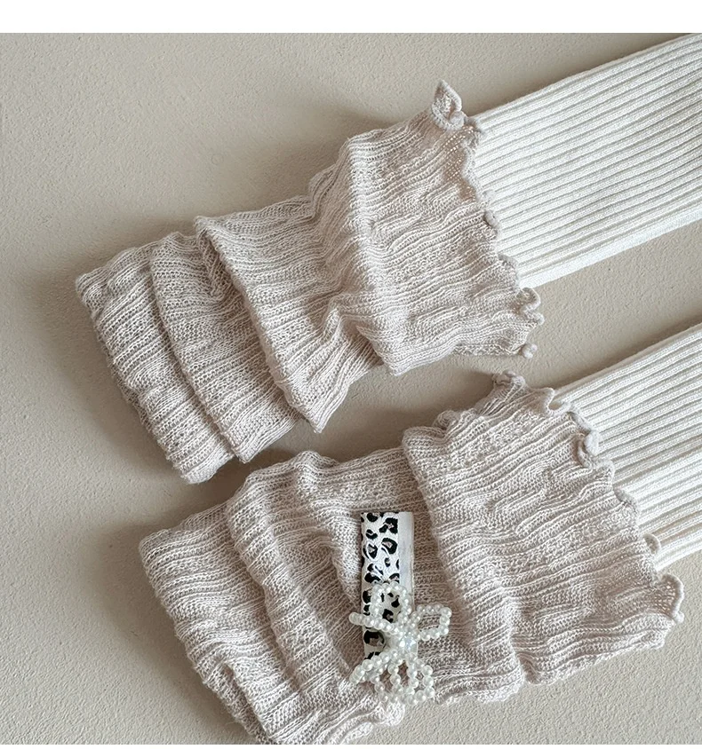 Leggings de algodón peinado para niña con lazo y encaje rayado