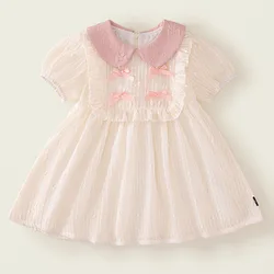 Vestido de niña de algodón con lazo en cuello y manga abombada