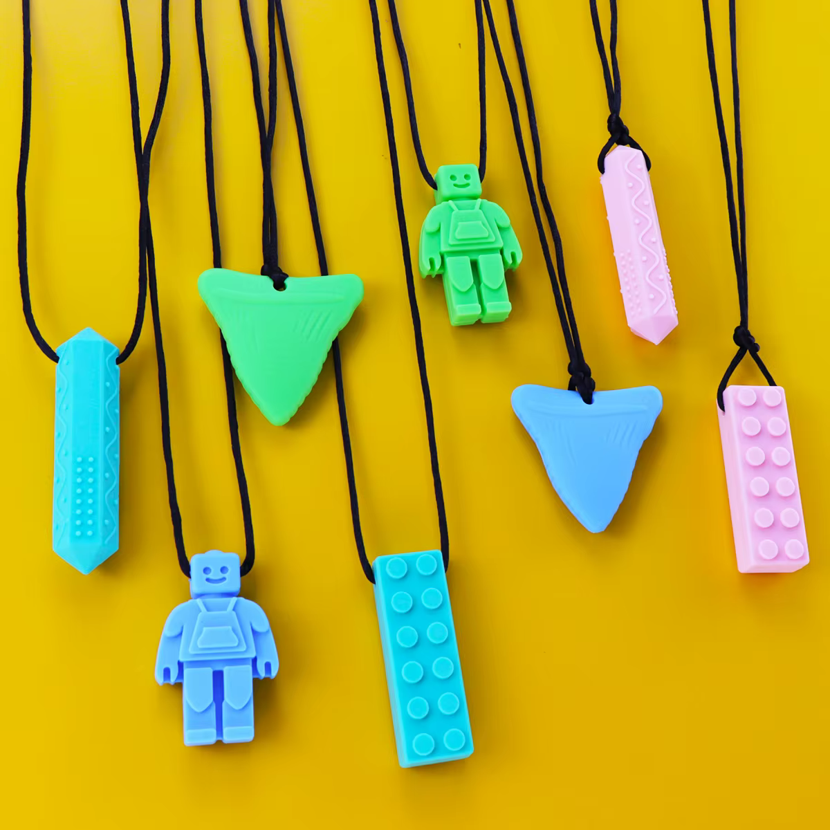 Mordedor de silicona J para niños
