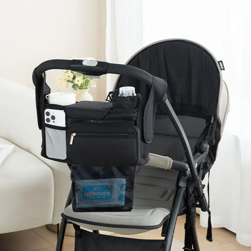 Bolsa de pañales Doona para cochecito, impermeable negra portátil - imagen 4