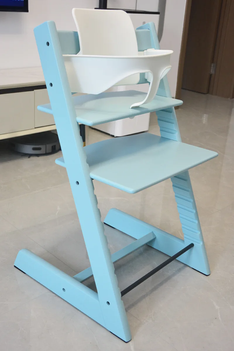 Valla protectora para respaldo de silla infantil en uso