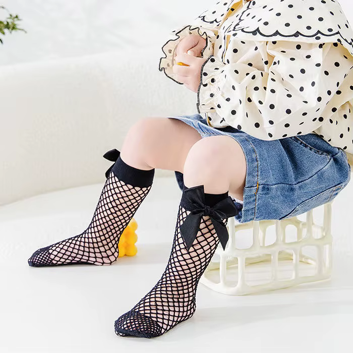 Calcetines altos de rejilla con lazo vintage blanco y negro unisex - imagen 5