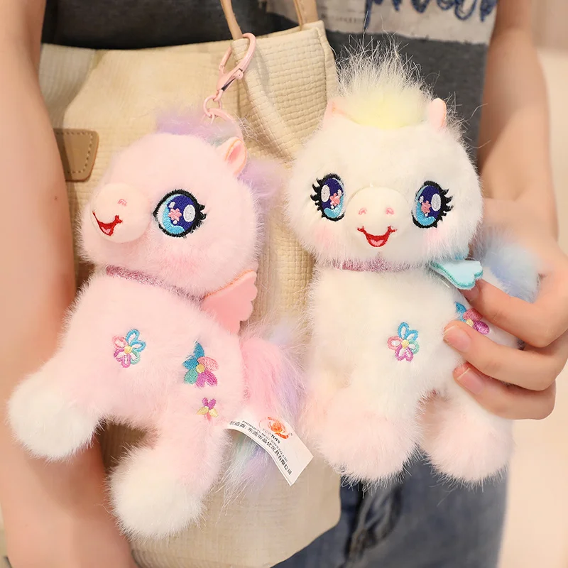 Peluche unicornio rosa y blanco suave con alas arcoíris - imagen 5
