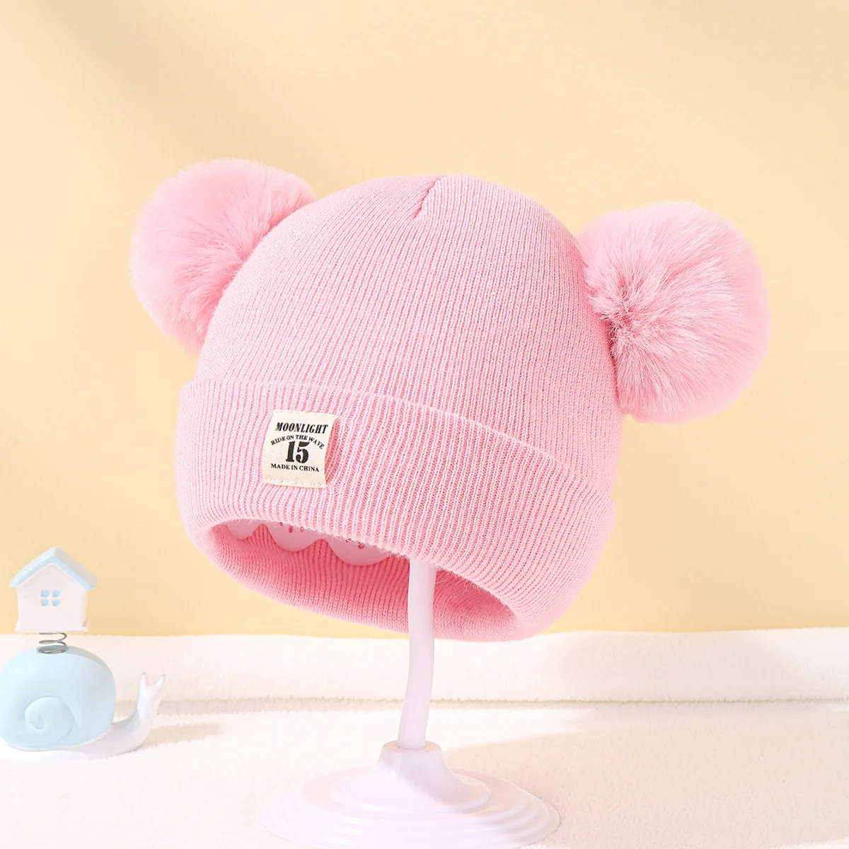 Gorro de punto con pompón para bebé - frontal