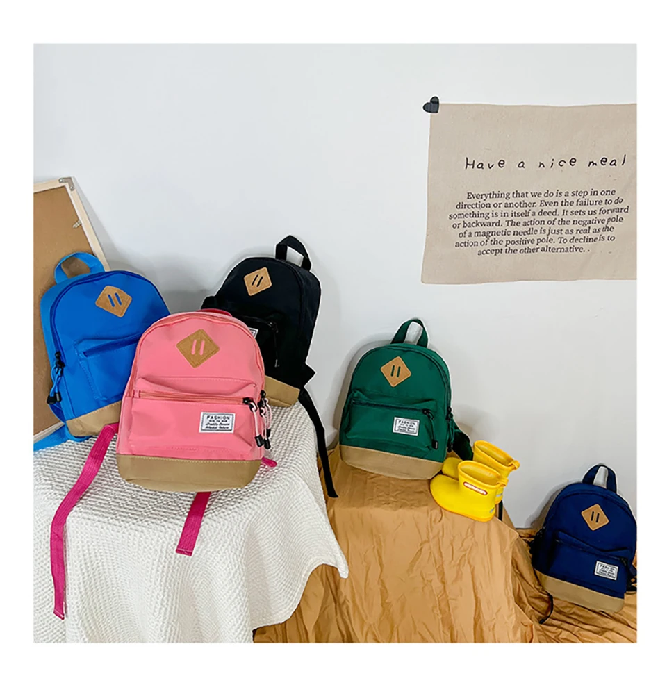Mochila infantil HOUSBAY con bloques de color