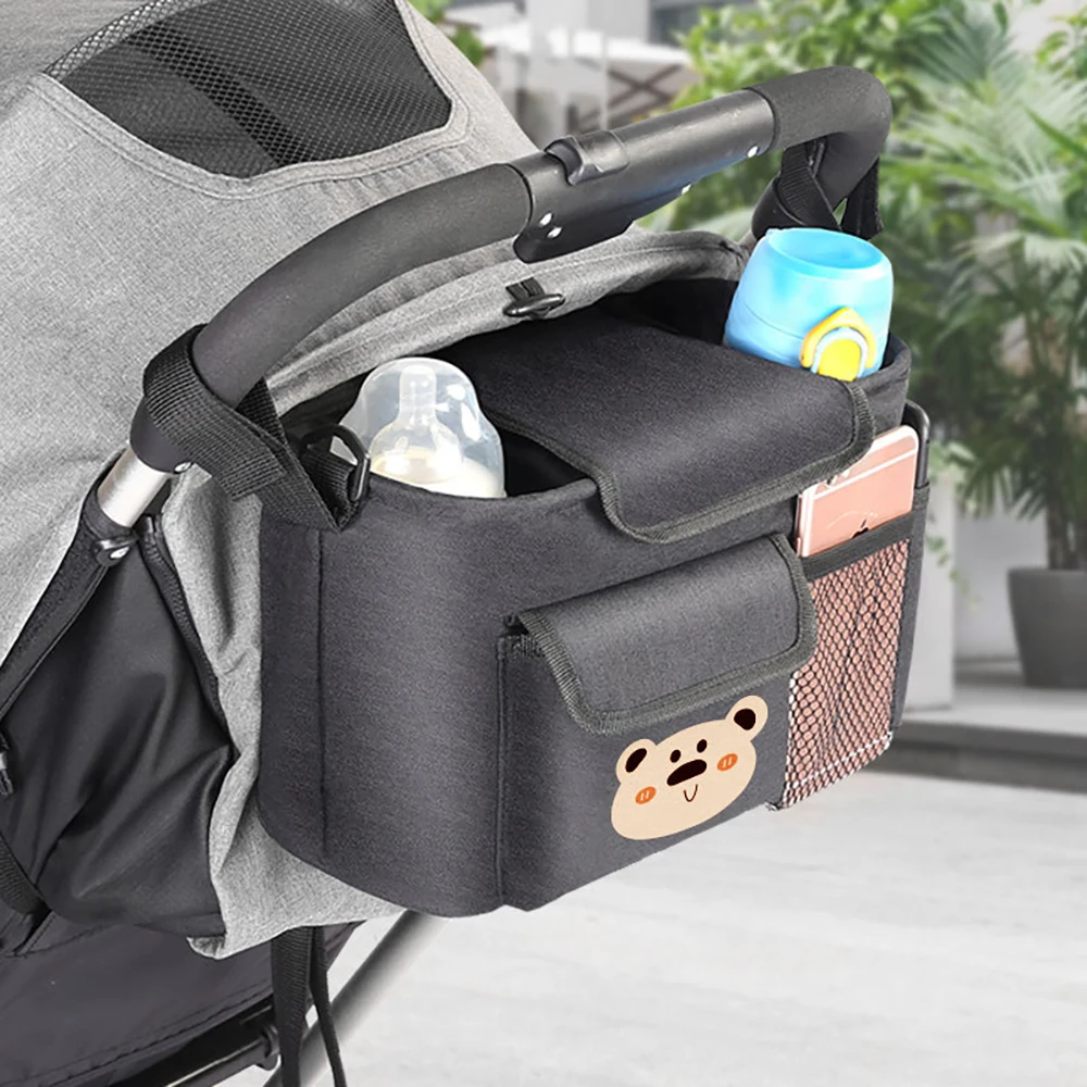Bolsa cochecito bebé viaje ligera impermeable con portabotellas pañal