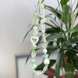 Cadena para teléfono móvil estilo lujoso verde con luz colgante