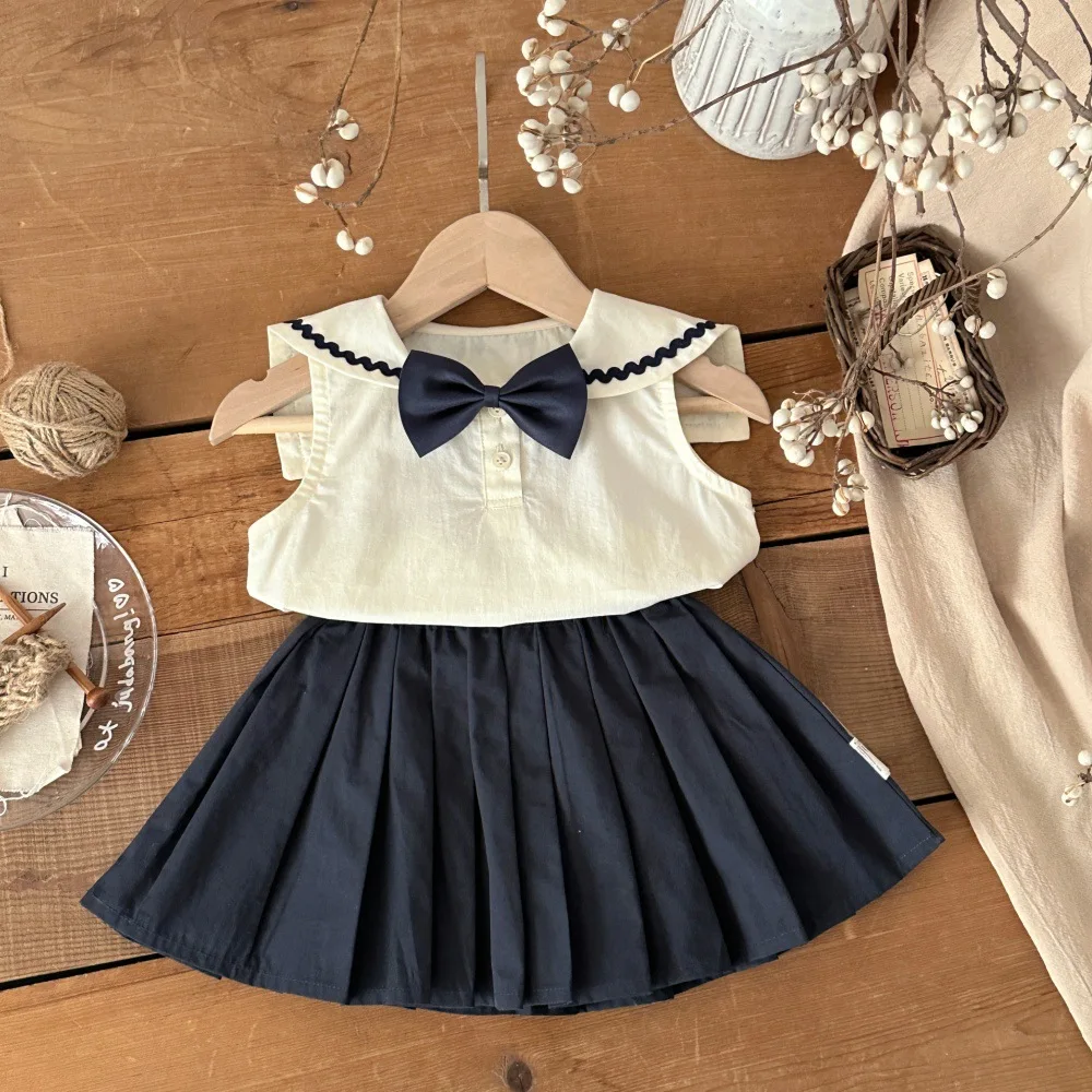 Conjunto bebé sin mangas con falda y lazo para verano - imagen 5