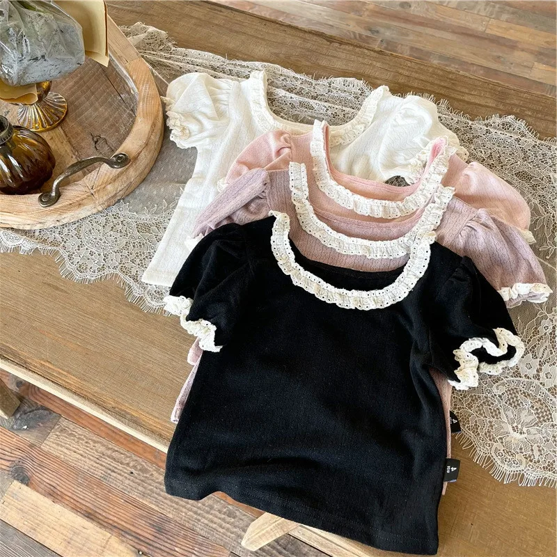 Camisa de encaje en tono melocotón