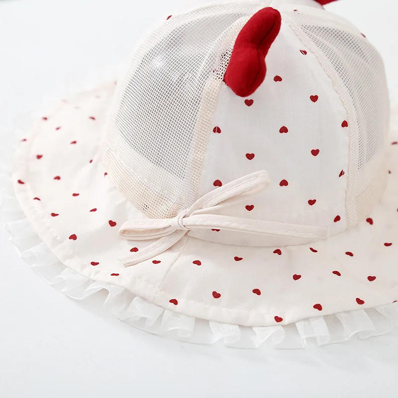 Gorro de pescador en malla para bebé con protección solar - imagen 2