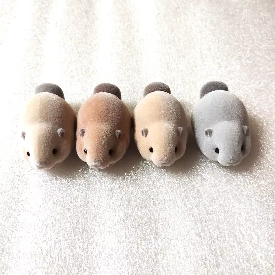 Nutria peluche apilable – Juguete de cápsula para niños - imagen 3