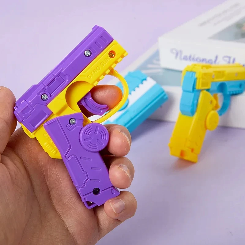 Mini Fidget pistola de juguete sensorial con spinner antiestrés - imagen 5