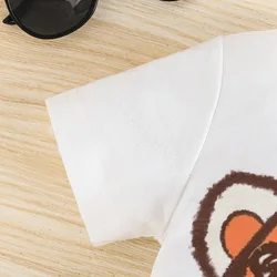 Conjunto verano para niño con camiseta estampada y pantalón corto