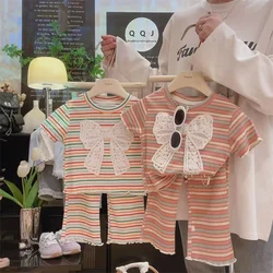 Conjunto de niña verano a rayas, camiseta lazo y pantalón