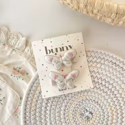 Pinzas para el cabello de niñas: mariposa rosa y flores bordadas