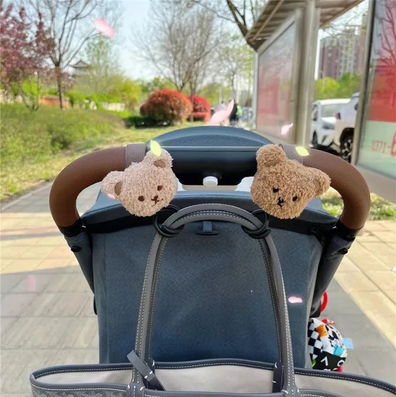 Gancho carrito bebé con figura de oso y bolsa colgante - imagen 5