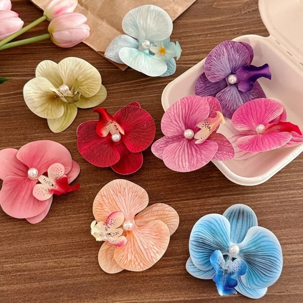 Pinzas para el pelo con flores de orquídea artificial, mariposas y perlas - imagen 2